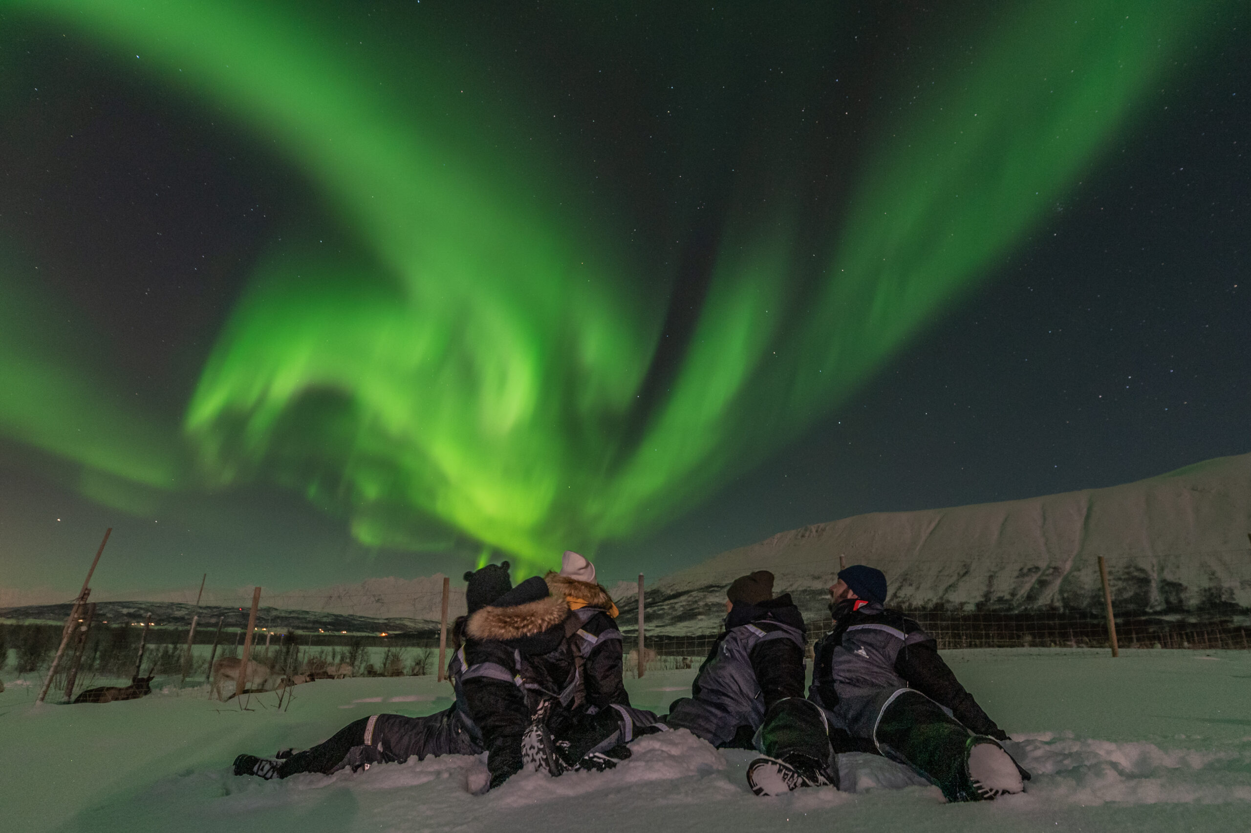people under aurora. Picture credit: Av lorenzoragazzi